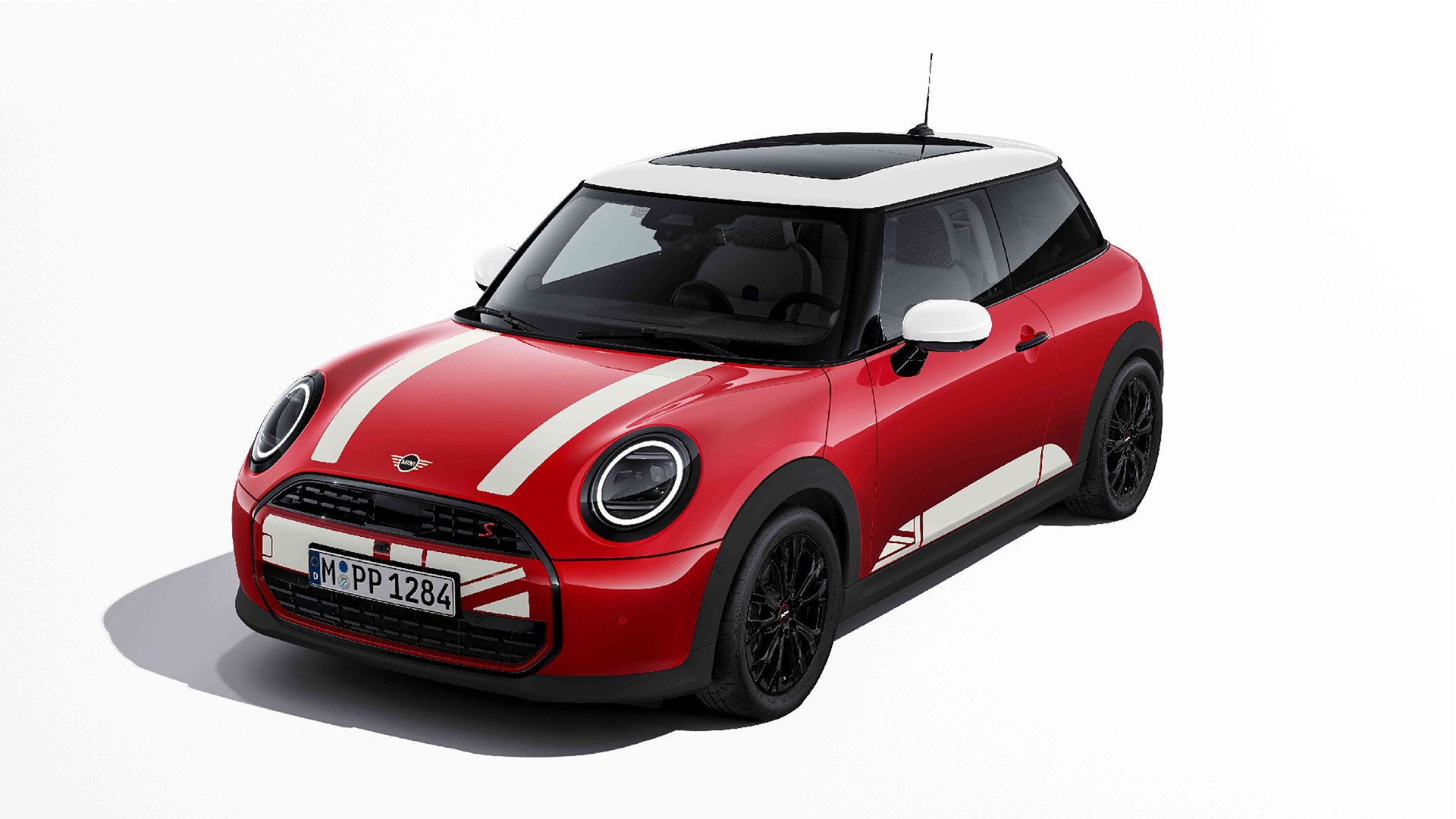 Front side view of MINI Convertible in Ocean Wave Green with MINI Heritage bonnet decals in white. 